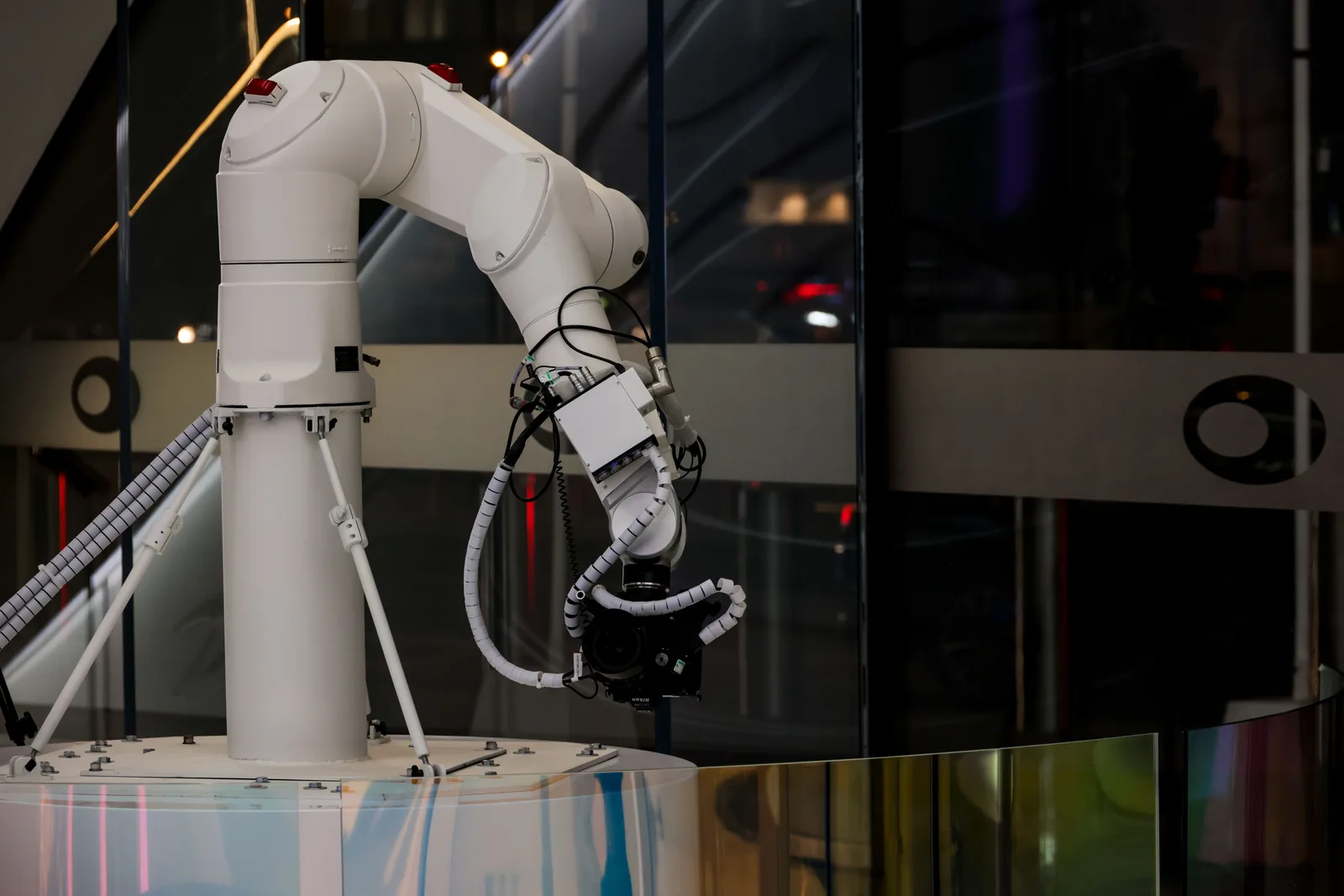 A robotic arm at work on a production floor